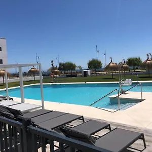 Bajo Con Jardin En Primera Linea De Playa , Malaga Spain